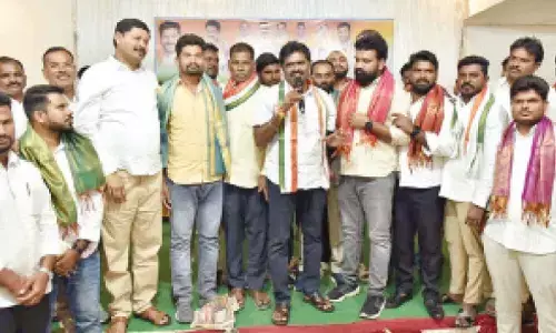 Congress Nalgonda town president Gummula Mohan Reddy along with municipal chair-man Burri Srinivas Reddy addressing youth workers