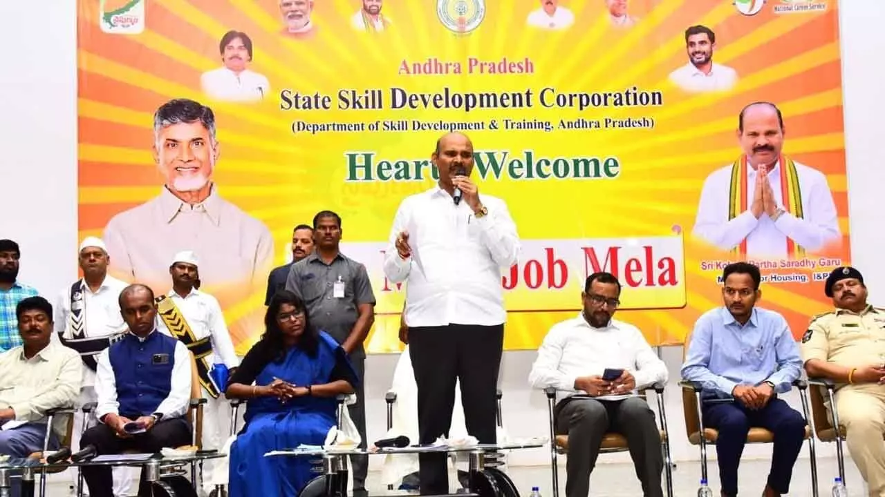 Minister Kolusu Parthasarathy speaking af-ter inaugurating Mega Job Mela in Nuzvid on Friday