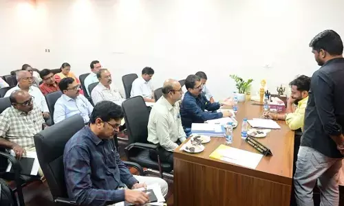 Minister of labour Vasamsetti Subhash reviewing the functioning of factories and boilers de-partments at the Secretariat in Velagapudi on Friday