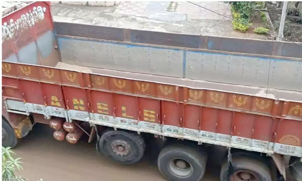 Sand-laden heavy lorries damage roads