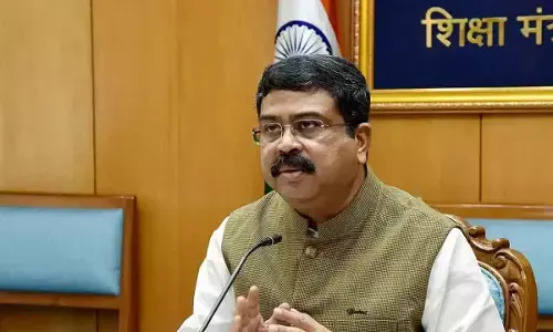 Pradhan counters Naveen