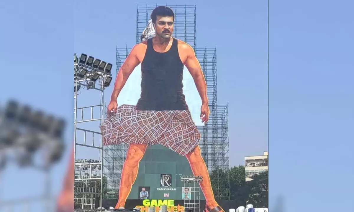 Ram Charan Cutout Enters Wonder Book of World Records; Dil Raju Receives Award