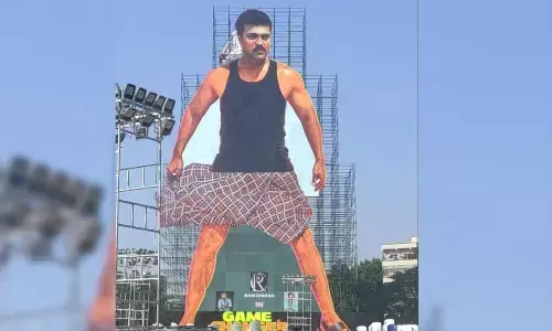 Ram Charan Cutout Enters Wonder Book of World Records; Dil Raju Receives Award