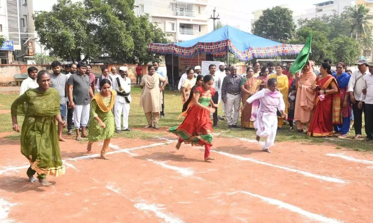 Collector A Thameem Ansariya flagging off a running race for visually im-paired persons in Ongole on Friday