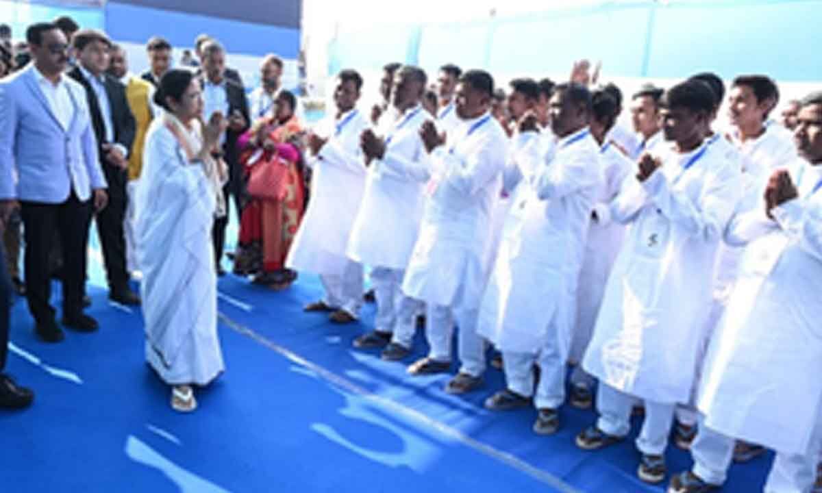 Mamata Greets Repatriated Fishermen on Sagar Visit
