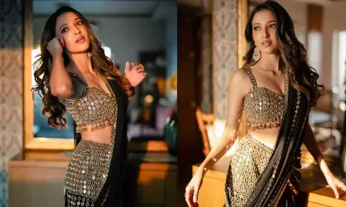 Neha Shetty’s glamourous golden saree look