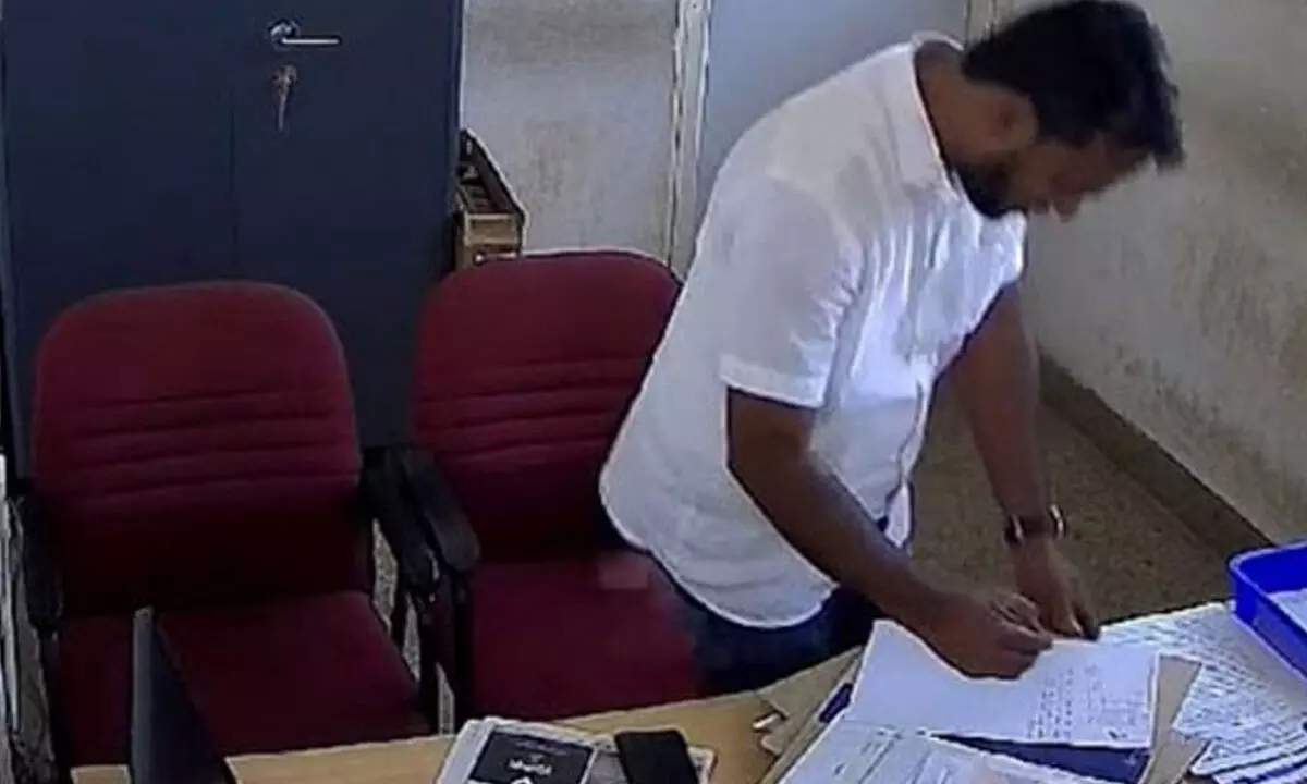 Man Caught Altering File at MUDA Office, Video Goes Viral and Concerns Raised