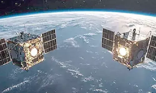 Satellites reach 3m in key docking test