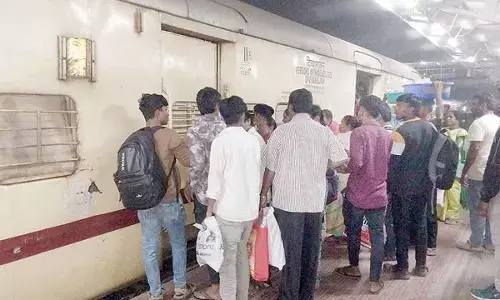 Rush of passengers in train station