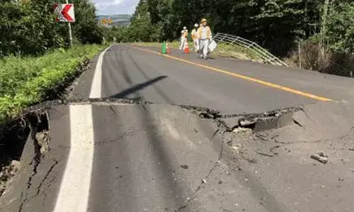 Japan urges continued caution on potential tremors, tsunamis