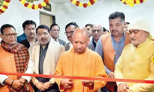 Yogi holds review meet on development works