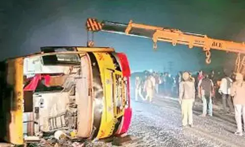 Young Woman Dies, 28 Injured as Bus Overturns on Rajamahendravaram Bridge