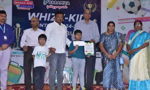 Cash awards presented to winners of Wiz Kid contest