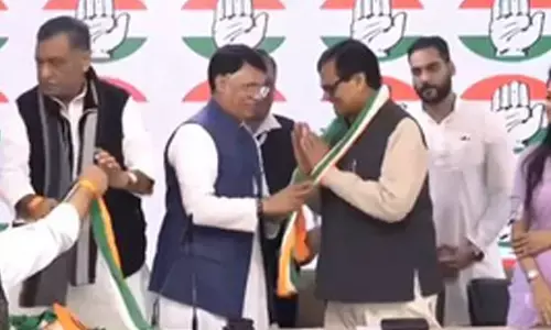Bhagirath Manjhi, son of mountain man, joins Congress; 6 more leaders inducted
