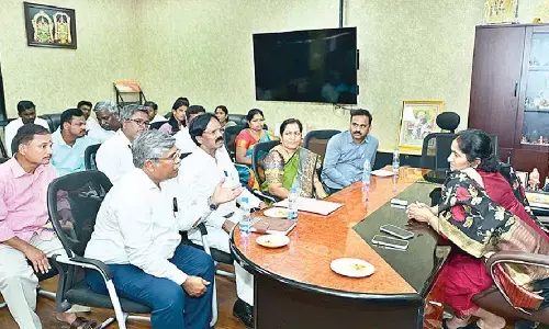 Minister Savitha for cent per cent results in Class 10