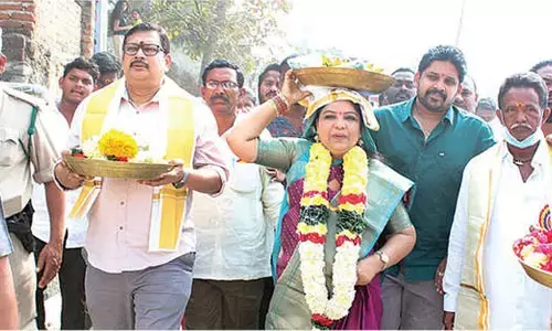 Minister Sandhya Rani offers silk robes to Polamamba