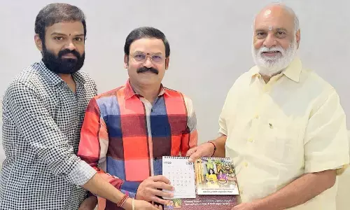 Director Raghavendra unveils 2025 calendar written by Kotha Srinivas