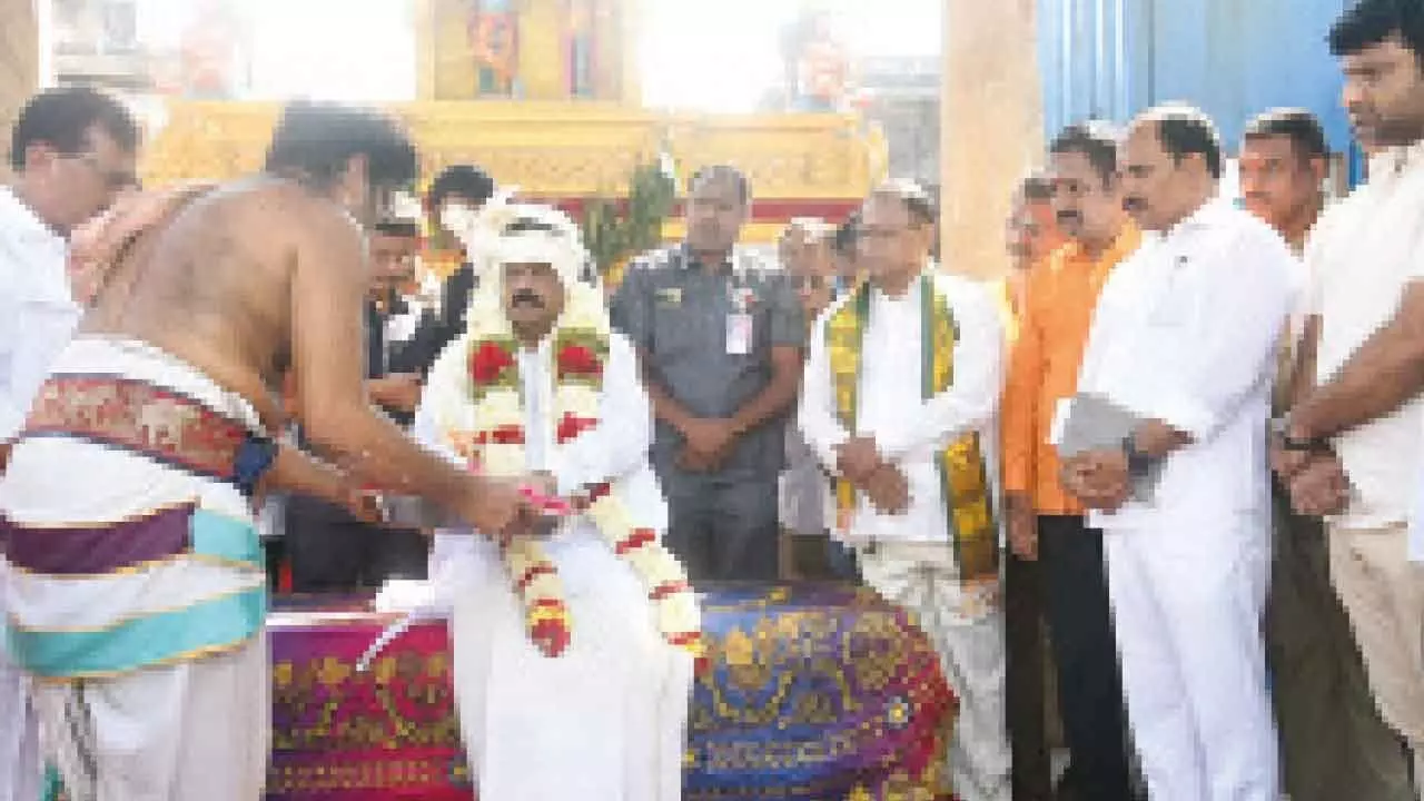 Endowments Minister Anam Ramanarayana Reddy performing special puja at Mulastaneswara Swamy temple on the occasion of Ratha Saptami on Tuesday