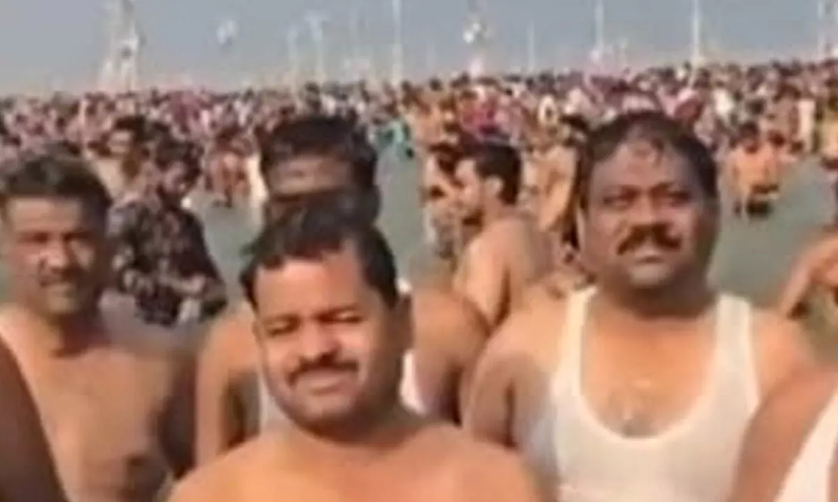 Karnataka contractors take holy dip at Sangam, pray for clearance of pending bills Karnataka contractors take holy dip at Sangam, pray for clearance of pending bills