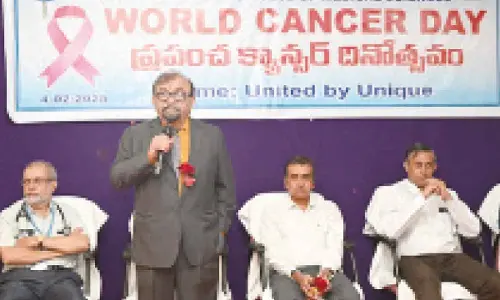 SVIMS Director Dr R V Kumar speaking at cancer awareness meeting in Tirupati on Tuesday. Dean Dr Alladi Mohan, Dr H Narendra and others are also seen