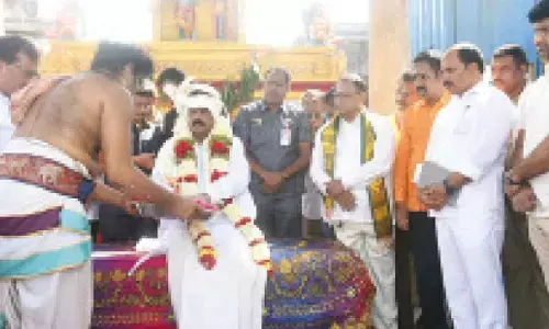 Endowments Minister Anam Ramanarayana Reddy performing special puja at Mulastaneswara Swamy temple on the occasion of Ratha Saptami on Tuesday