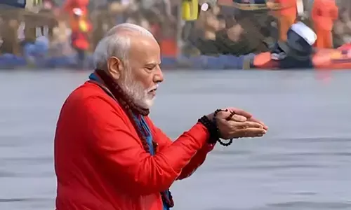 PM Modi takes holy dip at Triveni Sangam
