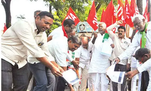 Farmers, workers burn Union Budget copies