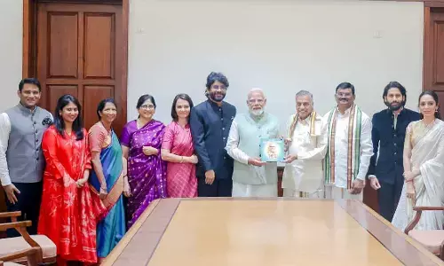 Actor Nagarjuna meets PM, Gifts Book on Legendary ANR