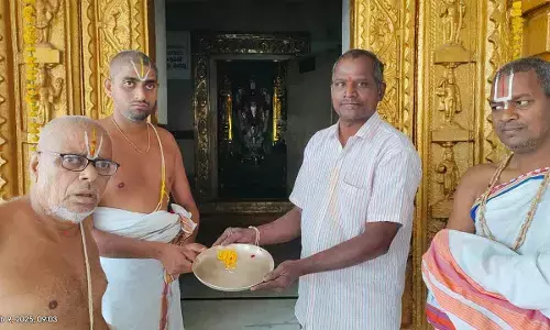 Devotees Offer Gold Mangalsutra