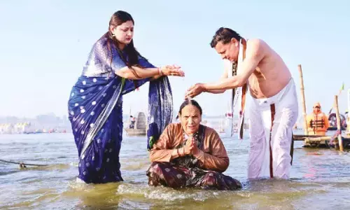 CM Dhami takes holy dip in Sangam, pledges grand Ardh Kumbh 2027 in Haridwar