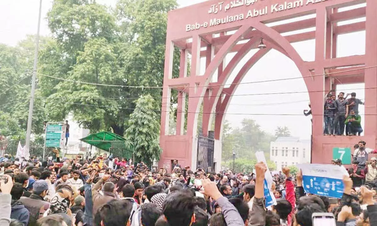 Jamia students protest action against scholars Jamia students protest action against scholars