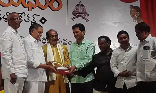 Second production team receiving award from MLA Mandali Buddha Prasad