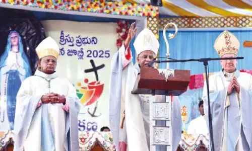 Bishop Thelagathoti J Rajarao and other members at Gunadala Mary Matha Shrine in Vijayawada on Tuesday