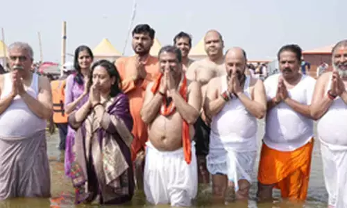 Dharmendra Pradhan takes holy dip at Triveni Sangam in Prayagraj
