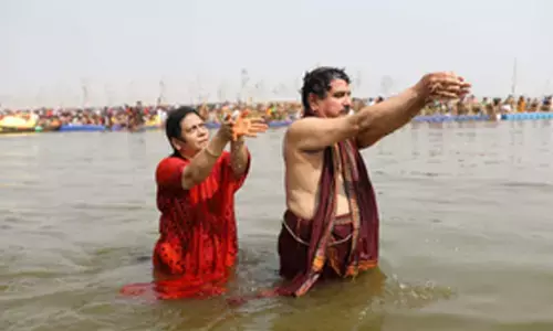 Pralhad Joshi takes holy dip at Triveni Sangam in Prayagraj