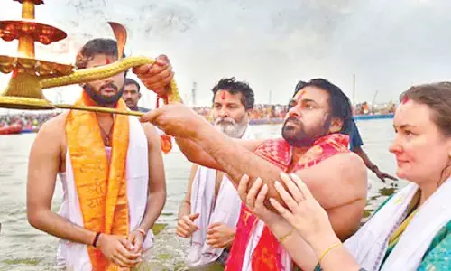 Pawan takes holy dip