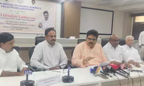 Chairman of the 20-Point Programme Lanka Dinakar holding a review meeting with officials in Kadapa on Tuesday