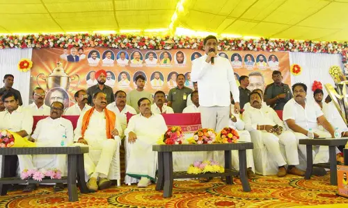 Minister for Roads and Buildings B C Janardhan Reddy addressing a meeting in Pathikonda on Tuesday