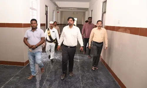 Collector inspects hospital