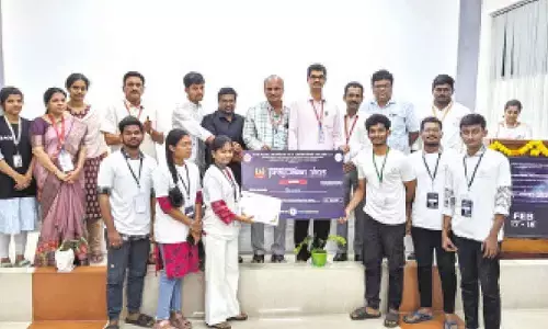 Director of SRKR Engineering College Dr M Jagapati Raju and Principal Dr KV Murali Krishnam Raju distributing the prizes to the winners at the college on Tuesday