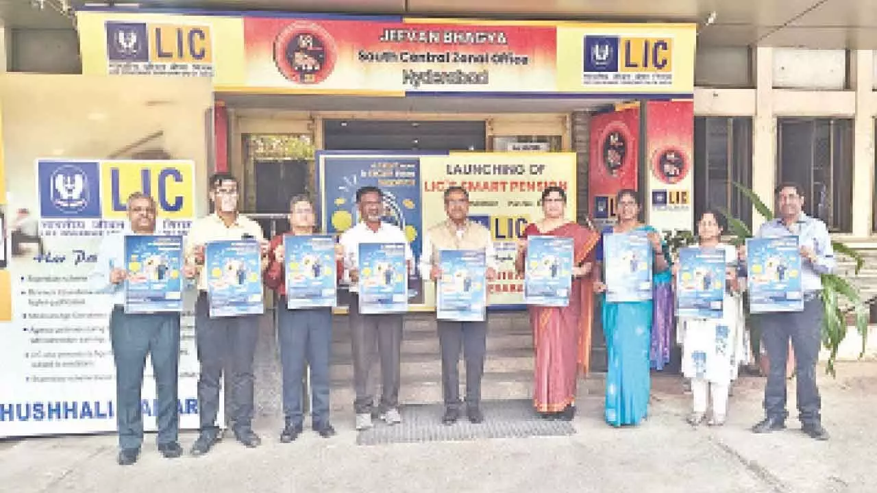 Puneet Kumar, LIC Zonal Manager, releasing a poster of the newly launched product in Hyderabad on Wednesday Puneet Kumar, LIC Zonal Manager, releasing a poster of the newly launched product in Hyderabad on Wednesday
