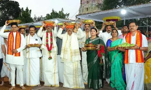 Silk clothes presented to Srisailam Mallanna