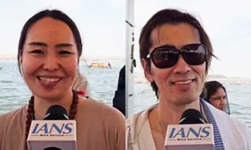 Japanese nationals take holy dip at Maha Kumbh