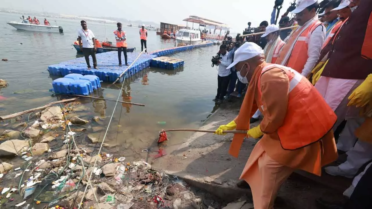 CM Yogi launches cleanliness drive at Sangam after worshipping Maa Ganga