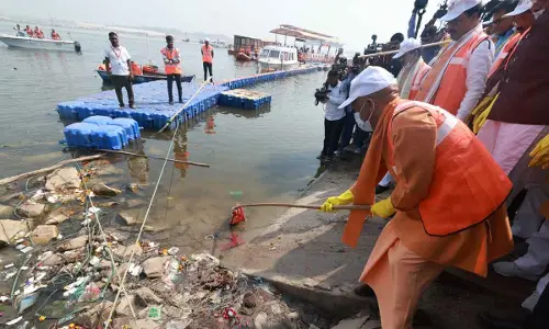 CM Yogi launches cleanliness drive at Sangam after worshipping Maa Ganga
