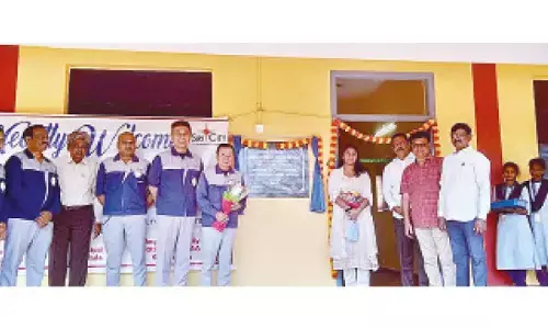 Managing Director of IMOP Taizo Iwami, CSR Director of Sri City Nireesha along with others at an upgraded classroom