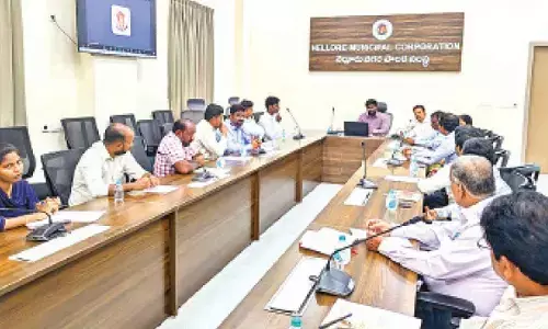 Nellore Municipal Corporation Additional Commissioner Nandan addressing a meeting of  representatives from noted business organisations on Tuesday