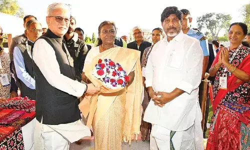 State handloom artisans weave magic as Sircilla saris wow Prez