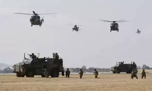 Dozens injured after Australias army vehicles crash