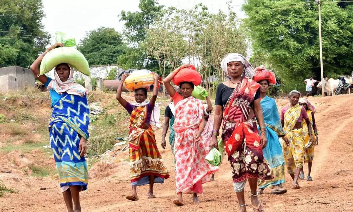 Villagers endure grueling walks for rations Villagers endure grueling walks for rations